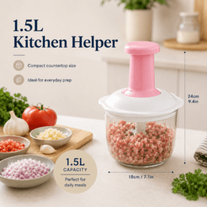 Manual food processor filled with chopped vegetables on a kitchen counter