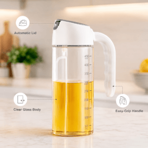 Automatic oil bottle standing on a kitchen counter