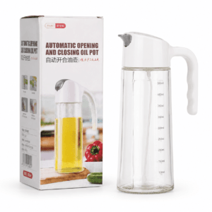 Automatic oil bottle displayed beside its packaging