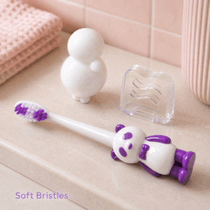Child-size toothbrush head and soft bristles close-up