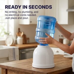 Hand pressing the manual water dispenser pump