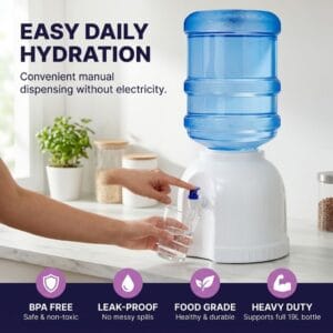 Portable dispenser pouring water into a drinking glass